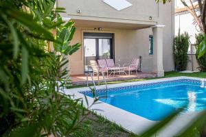 Modern beach villa with parking and private pool