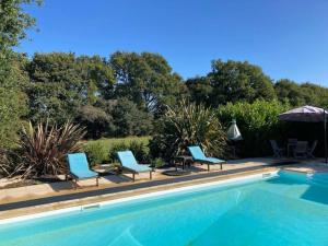 Maisons de vacances Longere Bretonne avec piscine chauffee a 20 minutes de la mer : photos des chambres