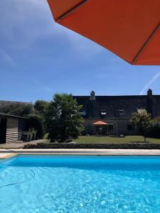 Maisons de vacances Longere Bretonne avec piscine chauffee a 20 minutes de la mer : photos des chambres