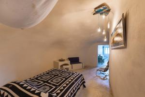 Deluxe Double Room (2 Adults + 1 Child) room in Caveland