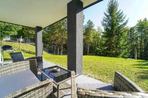 Behagliches Cottage mit Kamin mitten im Wald