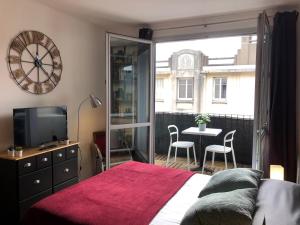 Appartements Studio avec balcon & parking gratuit - Tours Gare : photos des chambres