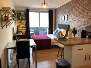 Appartements Studio avec balcon & parking gratuit - Tours Gare : photos des chambres