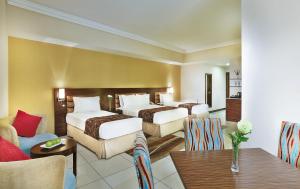 Deluxe Triple Room room in Gateway Hotel