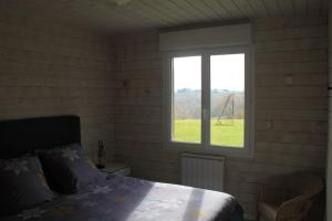 Maisons de vacances Gite de la Tuillere, maison contemporaine en bois avec vue et piscine : photos des chambres