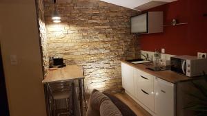 Appartements Cosy Love & Spa Love room avec spa, hammam et sauna privatif : photos des chambres