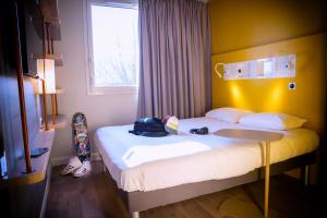 Hotels ibis budget Reims Parc Des Expositions : photos des chambres