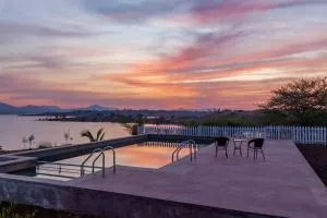 StayVista's Volendam Acres - Lake-View Villa with Pool, Amphitheatre & Turf - Zarvar