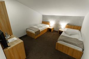 Twin Room with Private Bathroom room in Pensiunea Kristall Tecuci