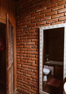 Chalé Sol com hidromassagem em meio a natureza