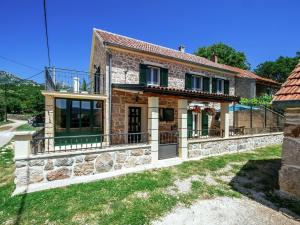 Stone house near river canyon