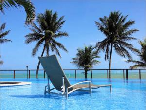 Apartamento a beira-mar com piscina