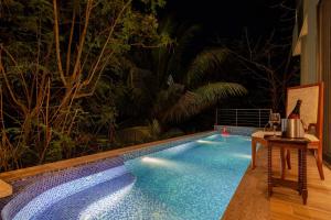 The Blue Horizon by StayVista - Featuring a beach-view villa with a swimming pool, indoor games, and a relaxing balcony