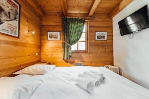 Chalets Furnished cozy chalet with a wooded garden and a large terrace : photos des chambres