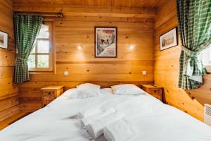 Chalets Furnished cozy chalet with a wooded garden and a large terrace : photos des chambres