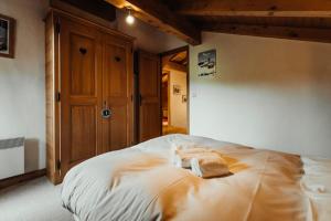 Chalets Furnished cozy chalet with a wooded garden and a large terrace : photos des chambres