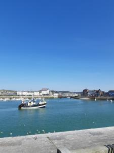 Appartements La Coquille - vue mer panoramique & port Treport : photos des chambres