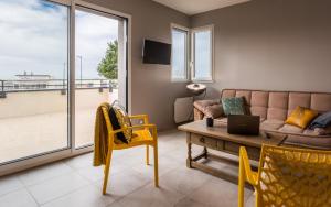 Appartements Tribord, appt avec terrasse et vue mer, parking : photos des chambres