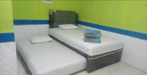 Hotel Indah Grogot Syariah Mitra RedDoorz