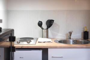 Appartements KASA Suite - Studio tout equipe et Cosy : photos des chambres