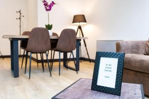 Appartements LA CAMBUSE TOPDESTINATION-BOURG - Centre ville - Classe 3 etoiles : photos des chambres