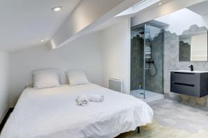 Appartements LA CAMBUSE TOPDESTINATION-BOURG - Centre ville - Classe 3 etoiles : photos des chambres