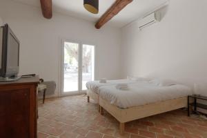 Villas Charming farmhouse in a quiet area with a parking in the courtyard : photos des chambres