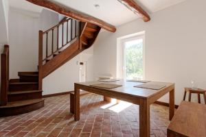 Villas Charming farmhouse in a quiet area with a parking in the courtyard : photos des chambres