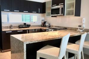 Beachfront Condo in Bucearías