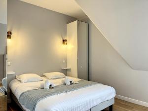 Appartements Le Loft Deauville - YourHostHelper : photos des chambres