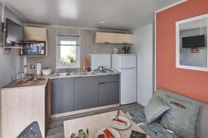 Campings Sunelia Le Petit Bois : photos des chambres
