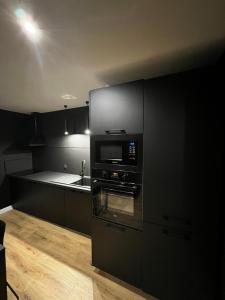 Appartements Appartement moderne full black Dunkerque centre : photos des chambres