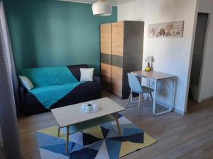 Appartements studio cosy proche du centre + parking gratuit : photos des chambres