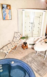 Maisons de vacances La Maison du Bonheur maison de campagne 20 personnes avec jacuzzi : photos des chambres