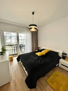 Apartament Bajeczny z widokiem na jezioro w Nautica Resort