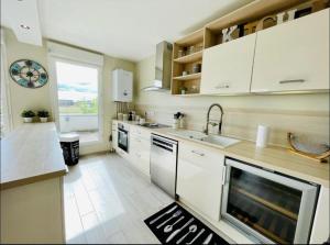Appartements Joli appartement Proche Disney : photos des chambres