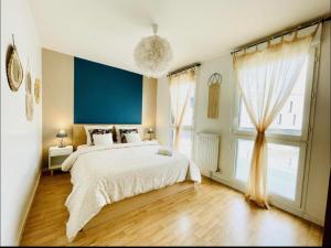 Appartements Joli appartement Proche Disney : photos des chambres