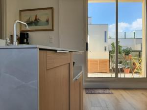 Appartements Les Terrasses Plage Benoit : photos des chambres