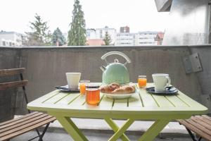 Appartements WAIKIKI-Garage-Terrasse-Fibre-Ensoleille-Calme-a 10min du centre ville-Clermont-Ferrand : photos des chambres