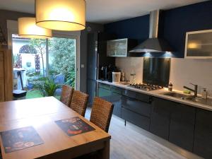 Appartements Agreable maison de ville ,calme avec tous les commerces a 150M : photos des chambres