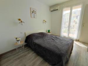 Appartements Casa Flamingo - Appartement calme et moderne - 4 - : photos des chambres