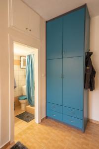 The Teal Studio in Kozani by Filos Inc