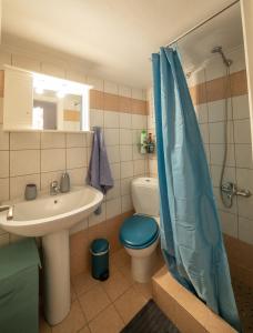 The Teal Studio in Kozani by Filos Inc