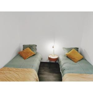 Appartements L'emeraude : photos des chambres