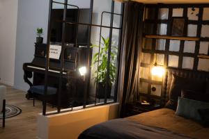 Appartements Entre Nous Le Du Bellay : photos des chambres