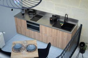 Appartements Entre Nous Le Du Bellay : photos des chambres