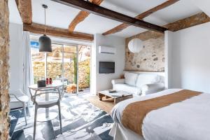 B&B / Chambres d'hotes La Bastide du Vieux Chene - LES COLLECTIONNEURS : photos des chambres