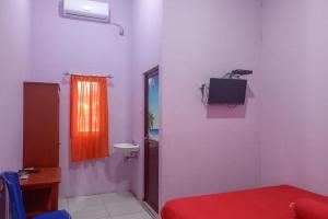 Jessy Homestay Lolak Mitra RedDoorz