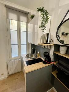 Appartements Le Cosy, charmant studio centre ville : photos des chambres