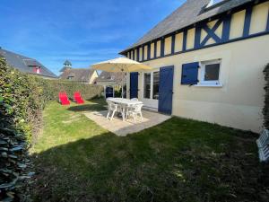 Maisons de vacances La Dunette Port Guillaume - Cabourg -piscine et mer a pied : photos des chambres